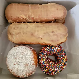 4 maple bars, chocolate with sprinkles,  and a lemon filled donut for today. Total $9.25