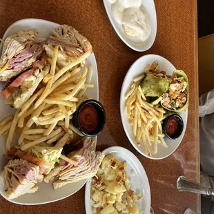 Club sandwich, chicken wrap, biscuits and gravy, has browns