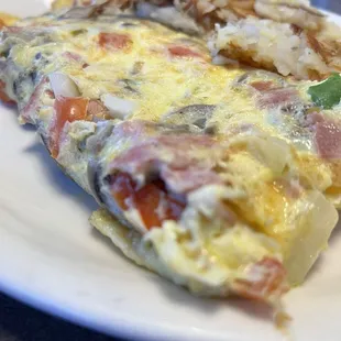 Veggie omelette with ham.