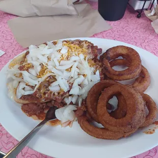 All beef hot dog with added chili/beans, cheese and onions. Beer battered onion rings. B