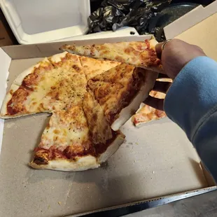 Cold, stale cheese pizzas.