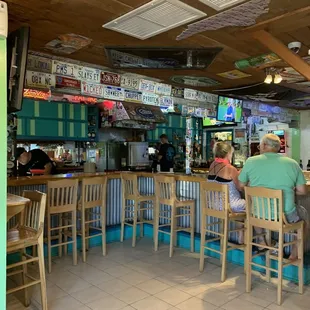 customers sitting at the bar