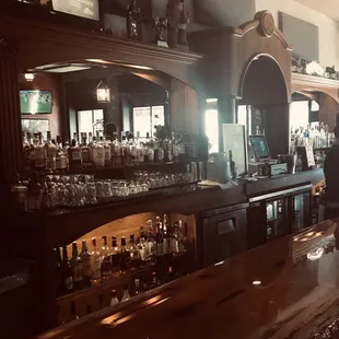 Large bar for seating. Great selection of alcohol.