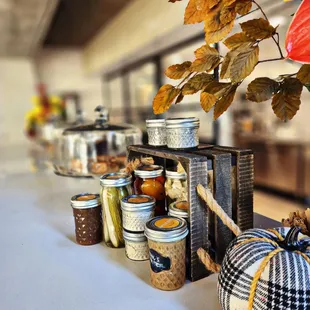 a table with jars of food