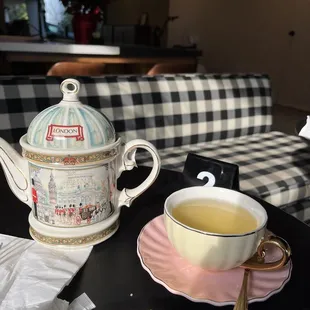 Lovely green tea served in adorable teapot and cup