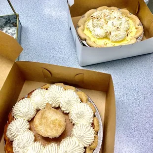 two pies in boxes