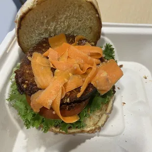 Fried Eggplant Sandwich - Vegetarian. Hand breaded eggplant, herb dressing, lettuce, tomato, pickled vegetable on brioche.