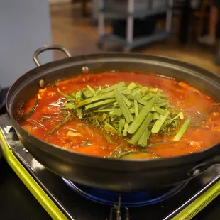 a pot of soup on a stovetop