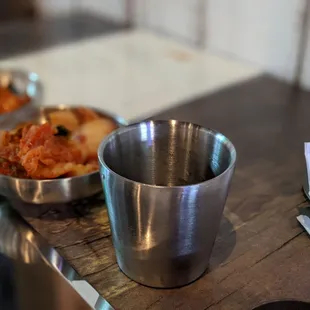 a table with bowls of food