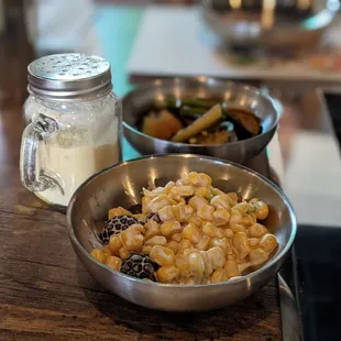 two bowls of food on a counter