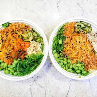 Left: lg bowl w/ classic salmon &amp; spicy aioli ahi; right: reg bowl over mixed greens w/ spicy aioli salmon. IG: @take.a.bite.with.me