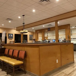 a bar and seating area