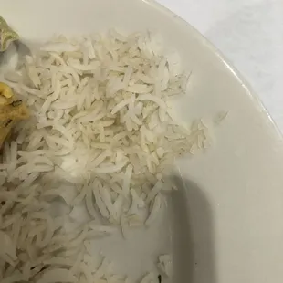 Uncooked or dried out rice.