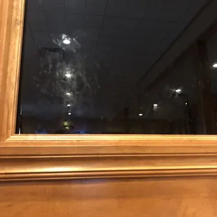 Finger prints all over the glass at our table.
