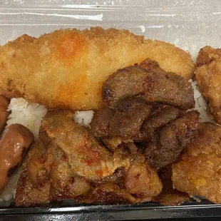 There's many different bentos but got this for bkft. Fish, smokies, spicy pork and chicken nuggets.