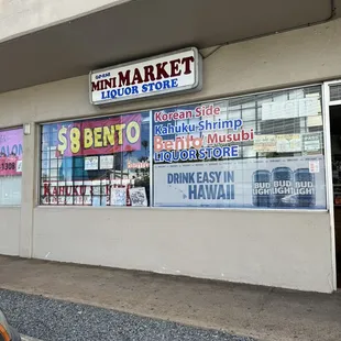 a storefront with a car parked in front of it