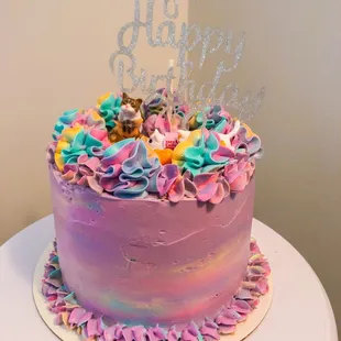 Funfetti magical swirl cake with cat cake topper figurines