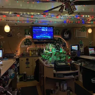 a bar with christmas lights and decorations