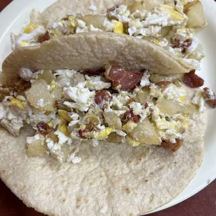 Bacon egg and potato tacos on corn tortillas