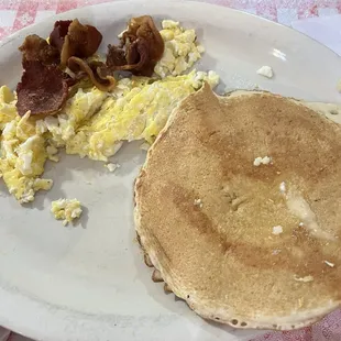 Pancake and egg breakfast with bacon