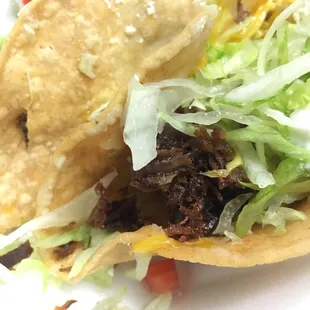 Dry meat, a pinch of rice and beans for $6.99 because all prices went up a dollars