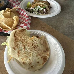 Gorila de harina with picadillo and in the back are barbacoa tacos