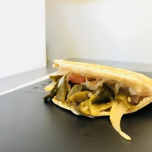 Gordita de rajas con queso (Grilled Anaheim peppers with cheese)