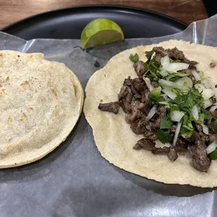 Gordita and a steak taco. The tortilla was made fresh to order!!