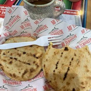 Corn masa gorditas. Egg and green salsa. Rajas y queso