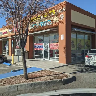 a car parked in front of the store