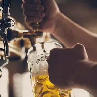 a beer being poured into a glass