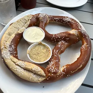 Housemade Bavarian Pretzel with fondue and beer mustard