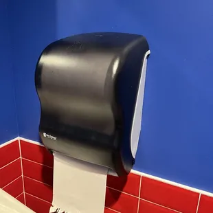 a roll of toilet paper on a roll dispenser