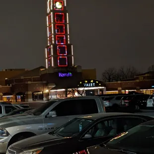 cars parked in a parking lot at night