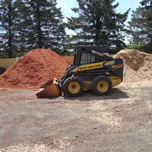Lots of mulch adjacent to the parking lot, on the south side.
