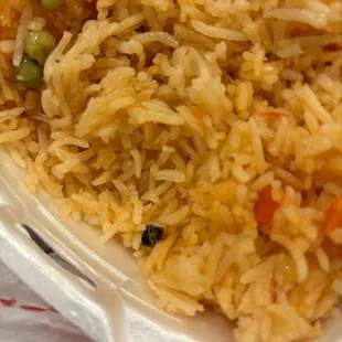 A whole roach was in the rice.. Glad I looked through it!!