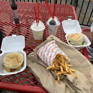 Bacon cheeseburger, mushroom Swiss burger, a medium fry, a pineapple shake and an Oreo shake