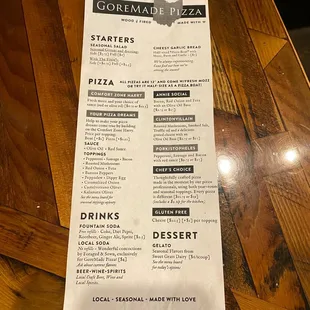 a menu on a wooden table