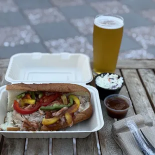 Chicken sandwich with side of coleslaw- beer from Hop Dogma in Half Moon Bay