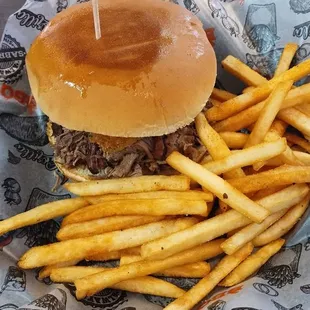 Combo Brisket Sandwich with fries and drink on the side.