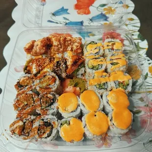 5 Piece Shrimp Tempura Roll 6 Piece Tuna and Avocado Roll and 6 Piece Golden California Roll