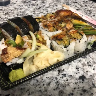 5 Piece Shrimp Tempura Roll, 4 Piece Dinosour Roll, &amp; 6 Piece Unagi Q Roll.