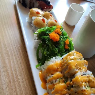 a close up of a plate of sushi