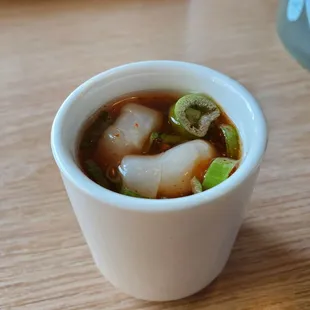 a closeup of a bowl of soup