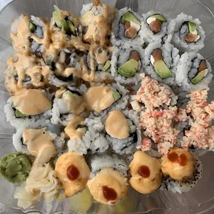 (Top left to bottom) crunch spicy salmon, philly, spicy scallop, dynamite, volcano