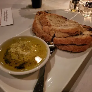 a plate of soup and bread