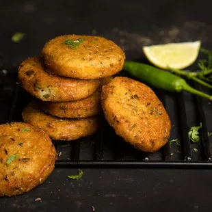 a pile of fried food on a cooling rack