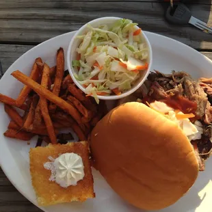 Pulled Pork BBQ Sandwich, Cornbread, Sweet Potato Fries, Southern-style Slaw.