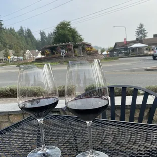 two glasses of wine on a table