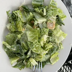 a plate of salad on a table